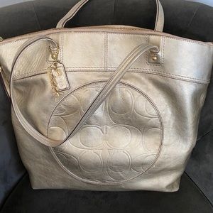 Large gold metallic coach tote